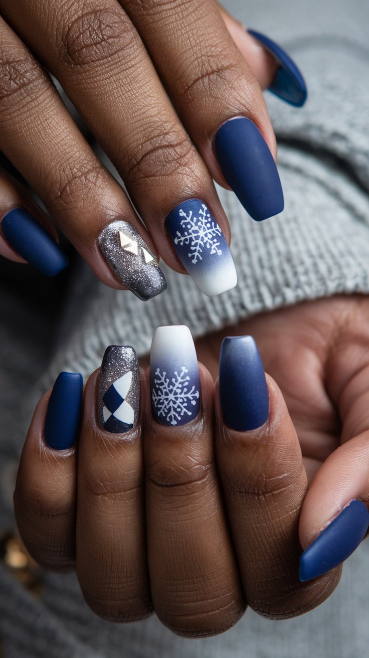 Elegant winter nail designs with deep blues, frosty whites, and shimmering silvers. Features include snowflake patterns, ombre effects, matte finishes, glitter accents, geometric shapes, and cozy sweater textures.