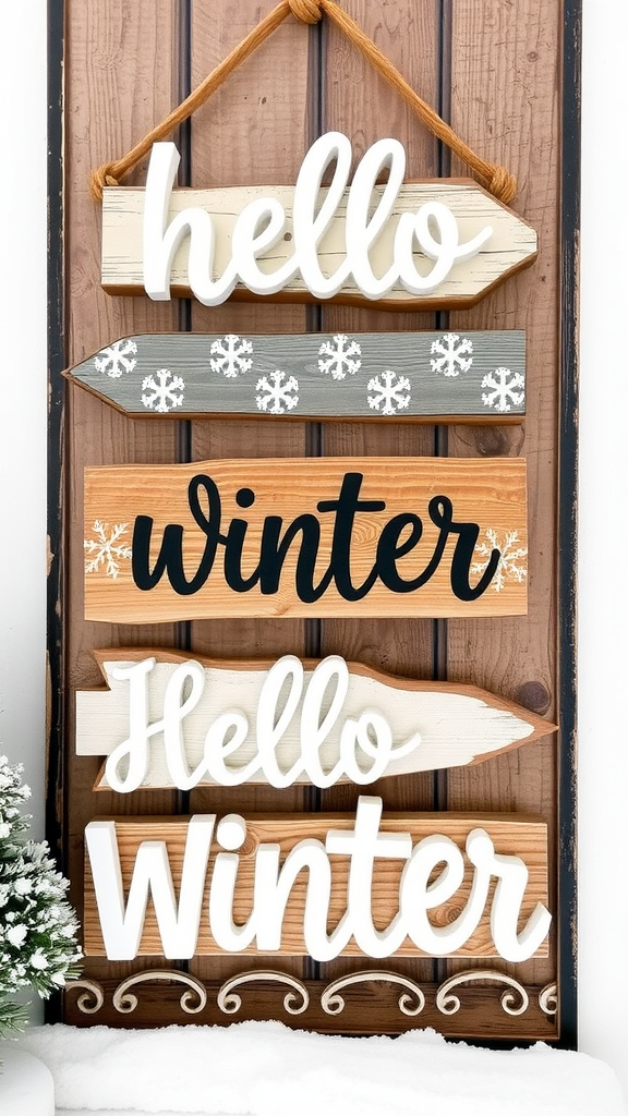 A decorative winter sign on a porch with a red door and green wreaths, surrounded by potted plants.