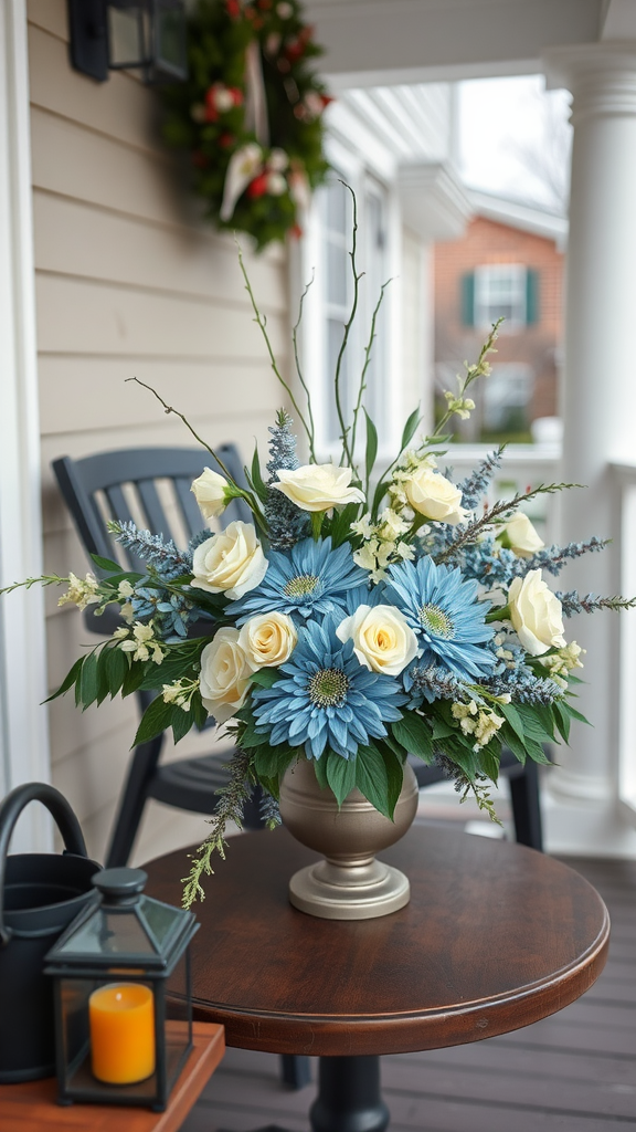 A winter floral arrangement featuring blue and white flowers on a porch table.