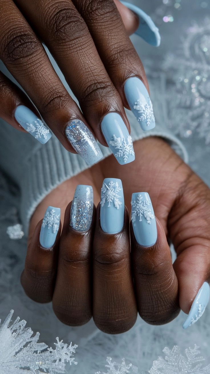 "Close-up of elegant icy blue manicured nails with delicate winter-themed nail art, featuring snowflakes and shimmering glitter, set against a soft frosty background with subtle winter scenery, showcasing a luxurious and chic winter vibe.