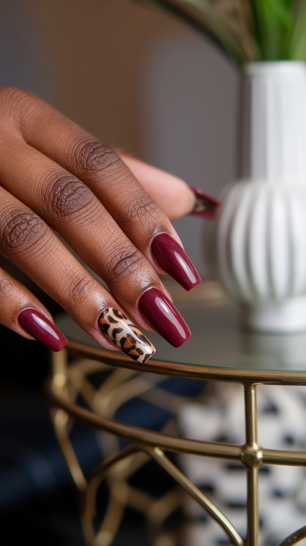 How to Style Burgundy Nail Designs for a Bold Stunning Look 14 Burgundy nails with an animal print accent nail