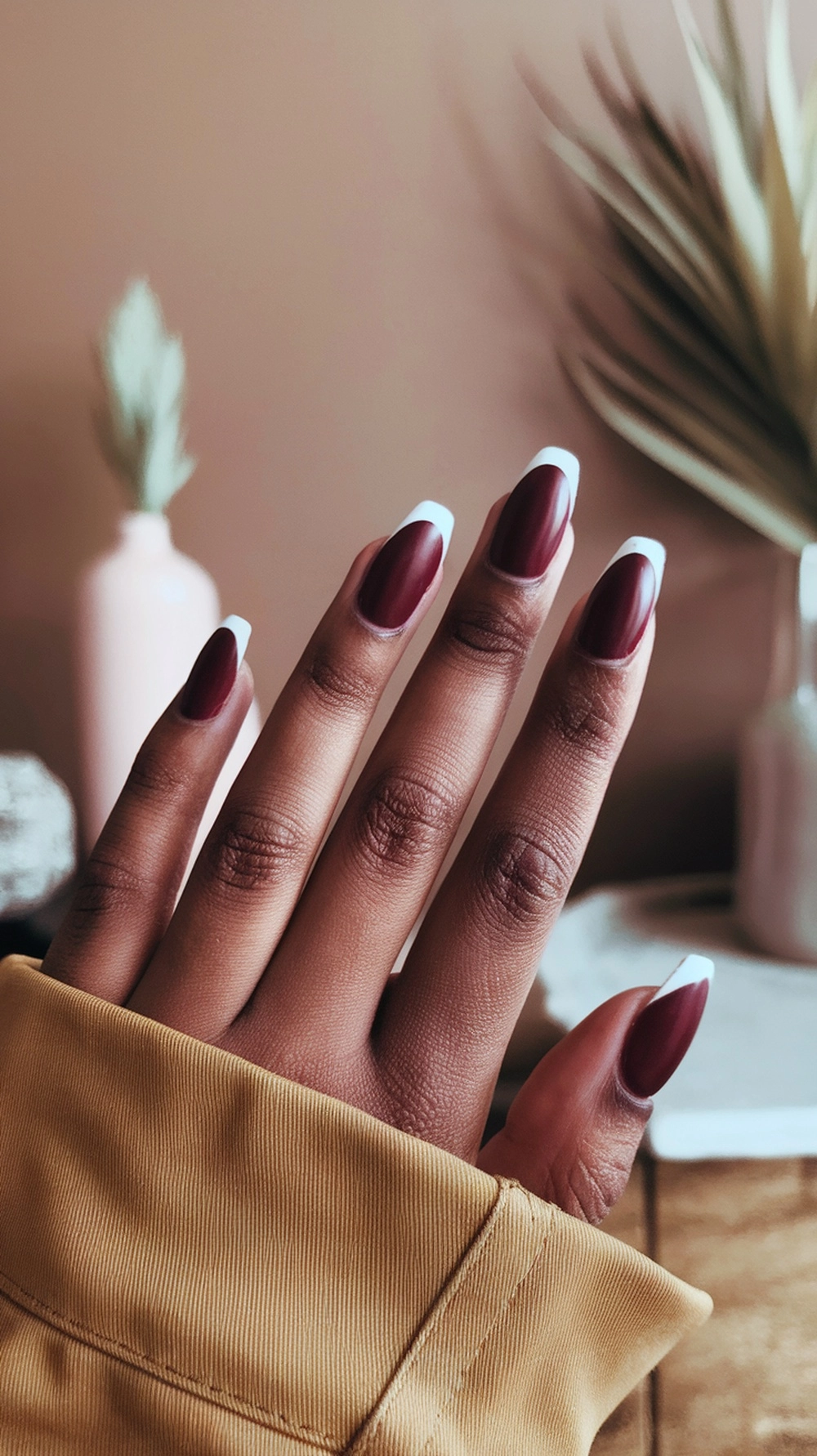 How to Style Burgundy Nail Designs for a Bold Stunning Look 23 Elegant burgundy nails with white tips, showcasing seasonal nail trends.