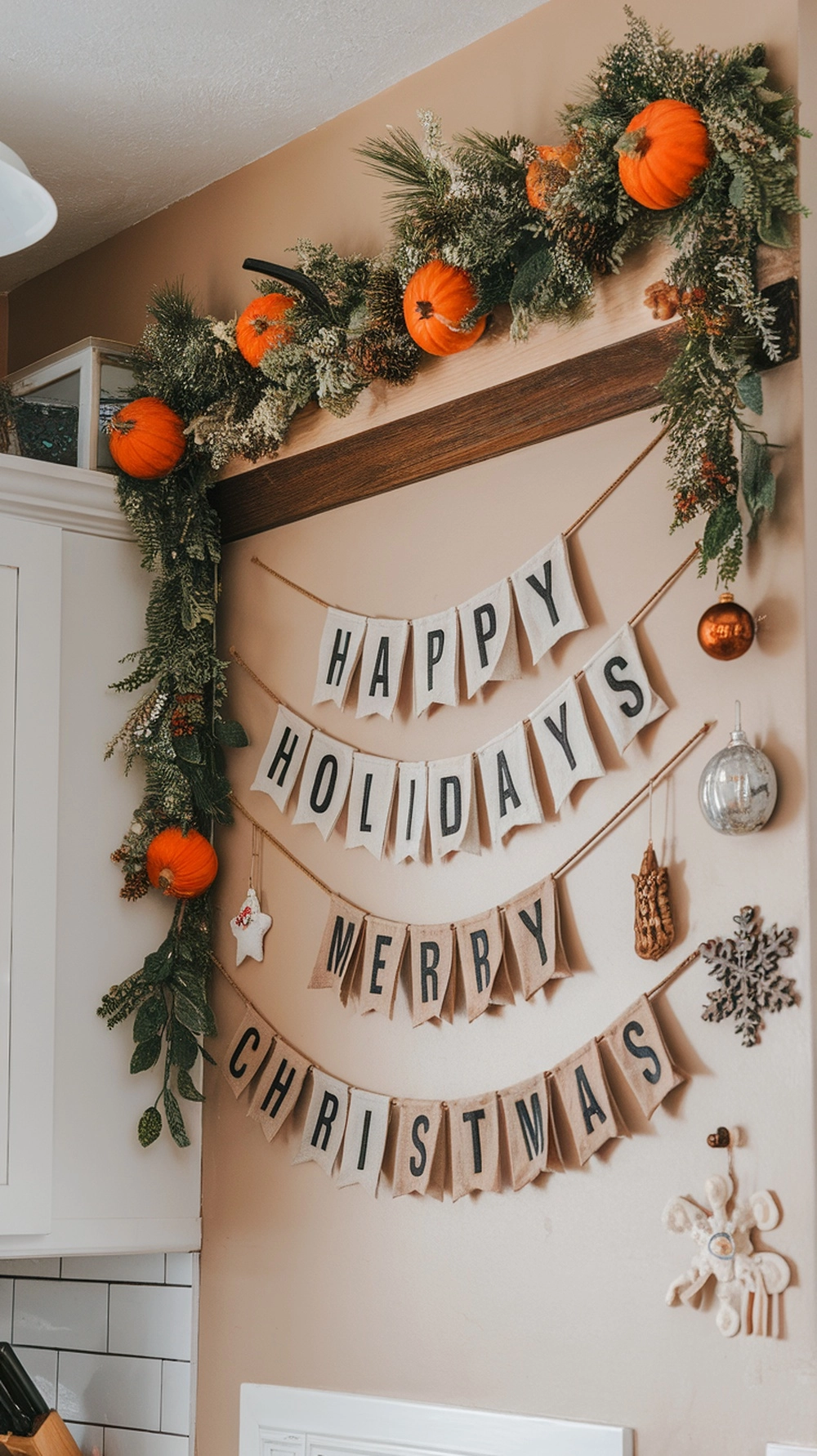 Cozy fall kitchen wall decor with pumpkins and festive banners.