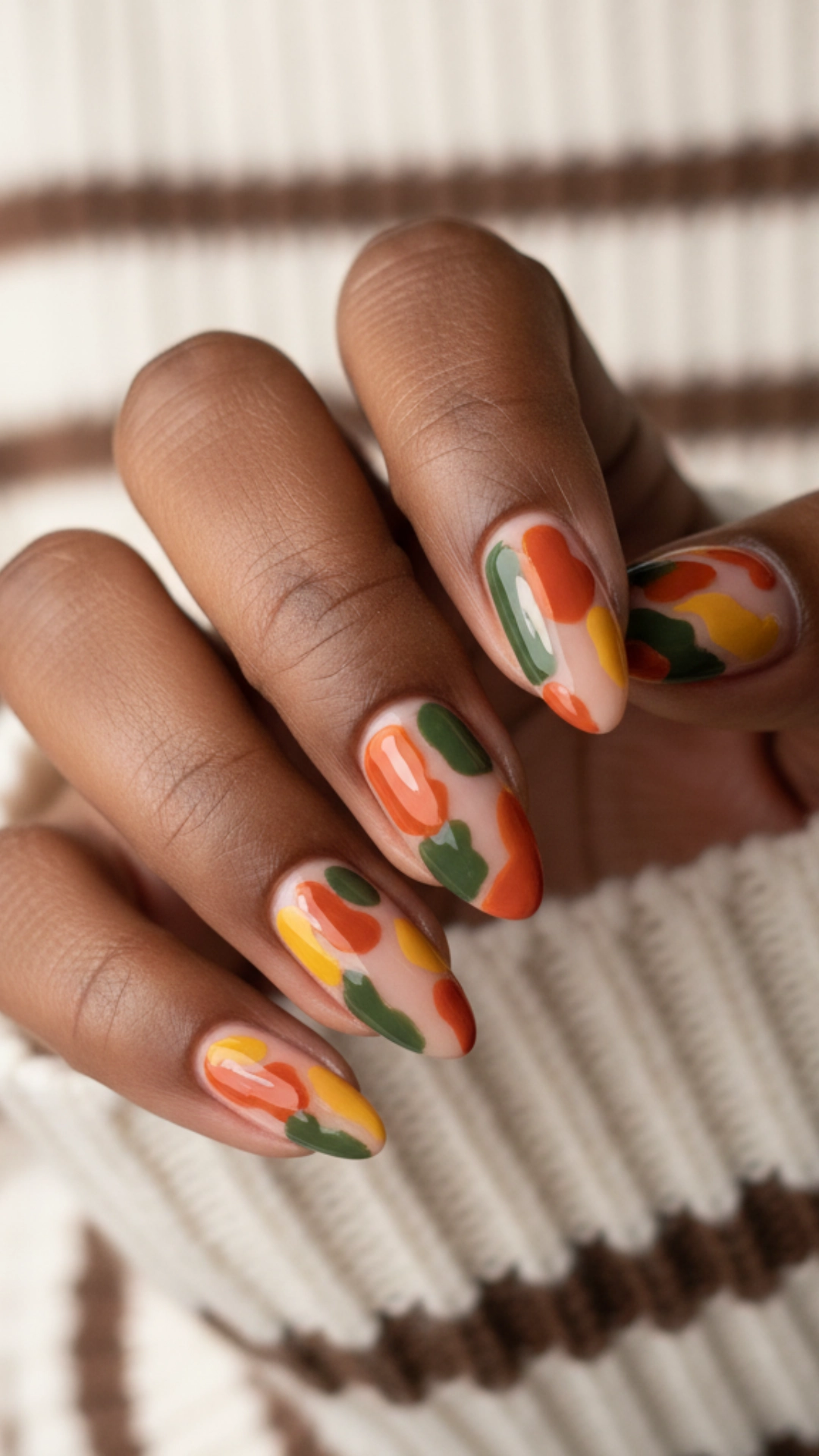 25 Jaw-Dropping Fall Nail Ideas You Must Try 13 Abstract, painterly nail art using a palette of classic fall colors.