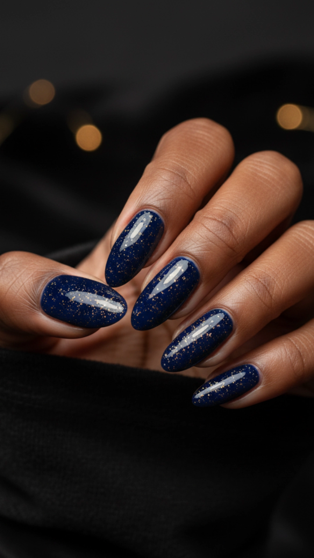 25 Jaw-Dropping Fall Nail Ideas You Must Try 20 A deep navy blue manicure with delicate gold flecks scattered throughout.