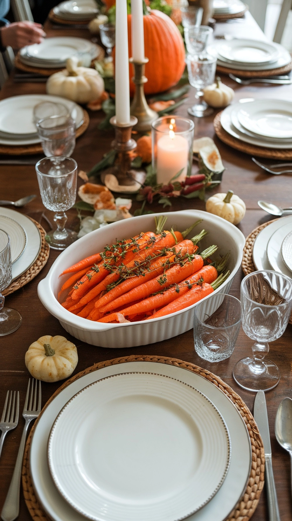 10 Easy Thanksgiving Side Dishes Everyone Will Love 4 A dish of honey glazed carrots with thyme on a beautifully set Thanksgiving table