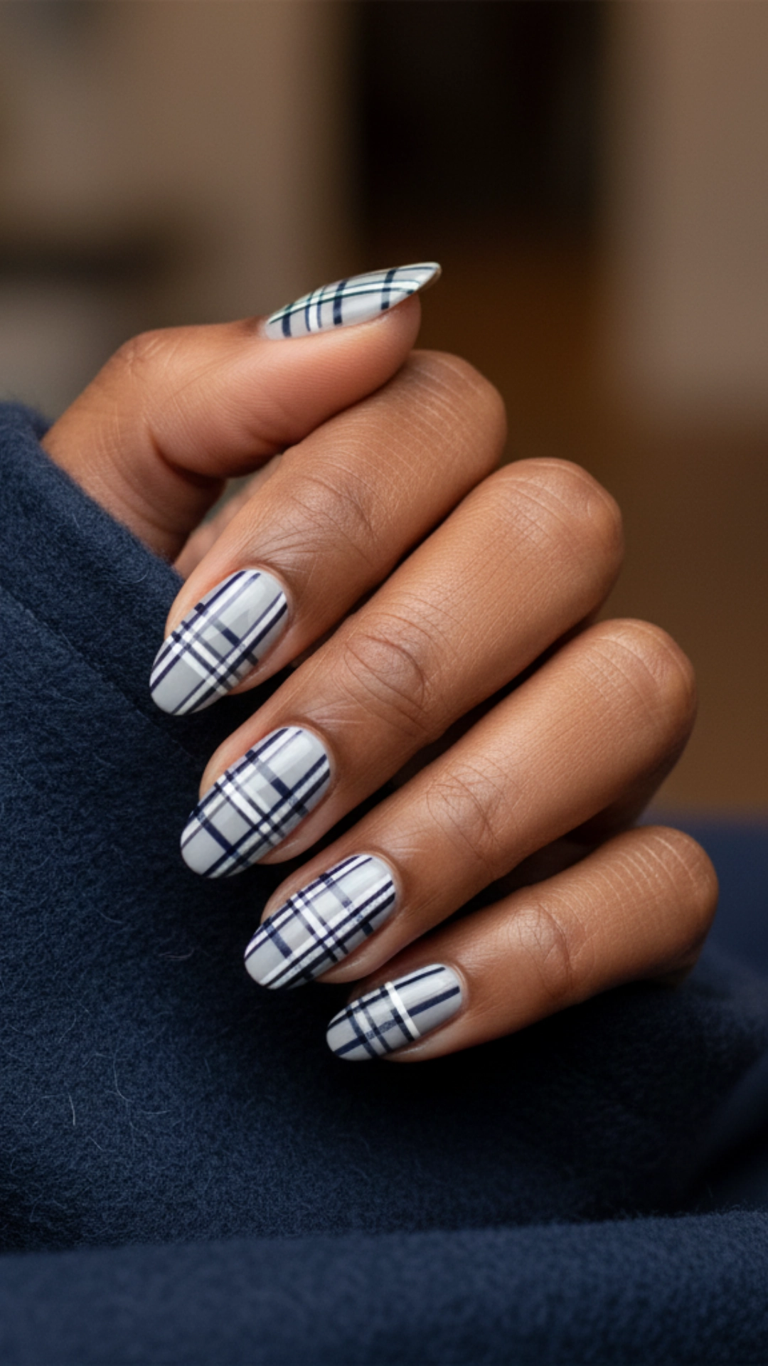 25 Jaw-Dropping Fall Nail Ideas You Must Try 11 Intricate plaid nail art using gray, navy, and white polishes.