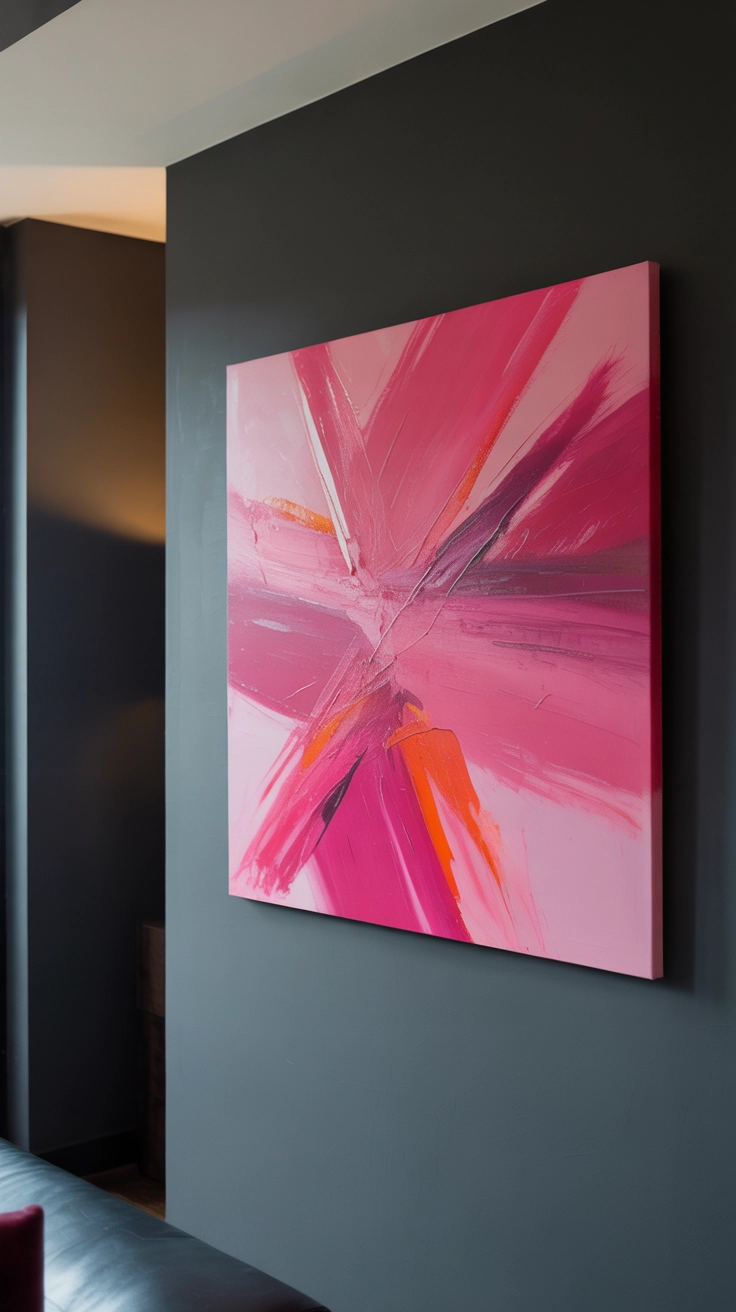 Bold pink abstract art contrasting against a dark charcoal grey bedroom wall.