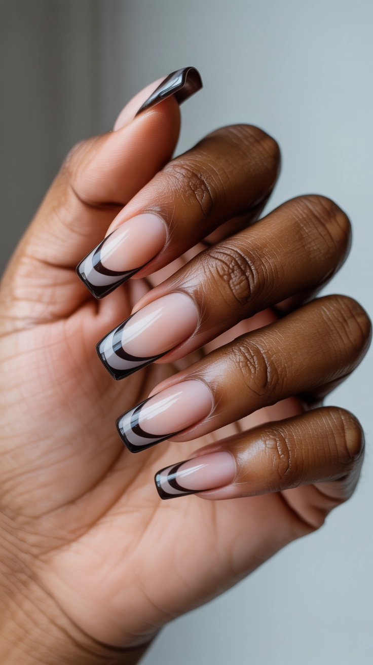 21 Double French Tip Nail Designs That Look So Trendy 4 Ultra-thin black double French tips on a nude nail base.